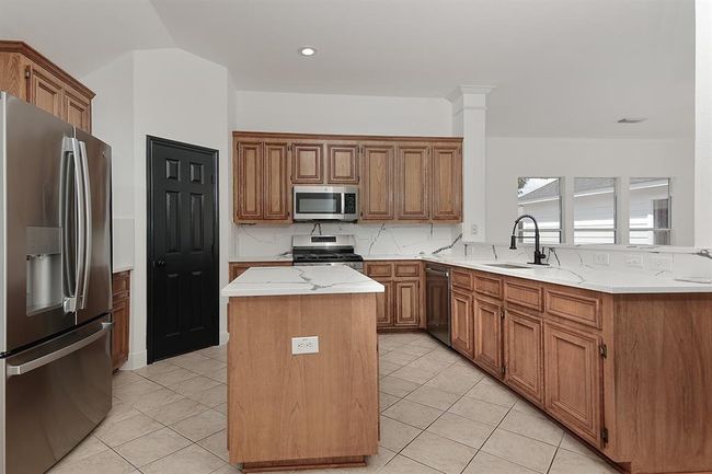 28511 Kevington Ct, House other with 4 bedrooms, 2 bathrooms and 2 parking in Spring TX | Image 9