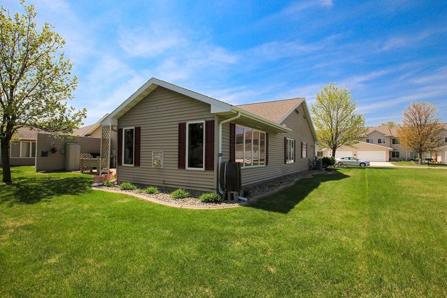 Enjoy the meticulously maintained landscaping in a fantastic location near parks and schools! | Image 14