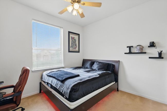 Bedroom #3 shares jack-n-jill bath and overlooks backyard. | Image 25
