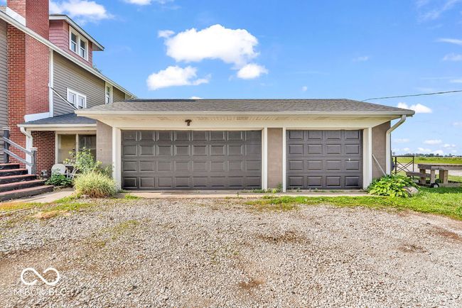 garage with driveway | Image 8