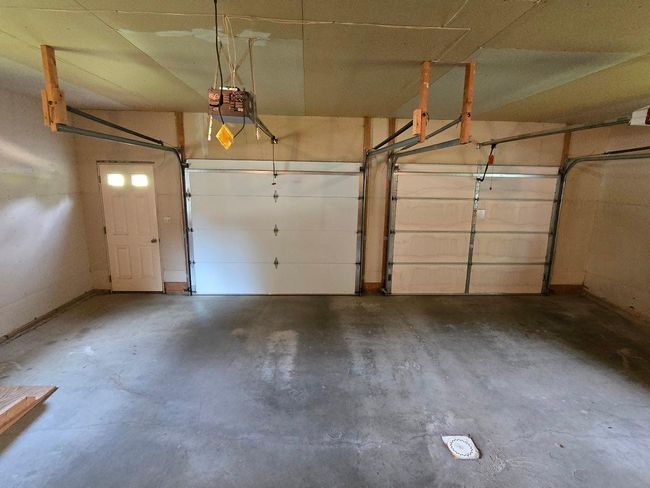 2 garage door openers, floor drain | Image 4
