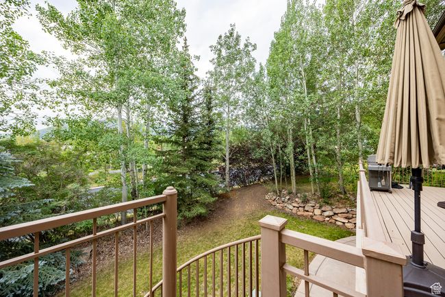 Wooden deck featuring a mountain view | Image 34