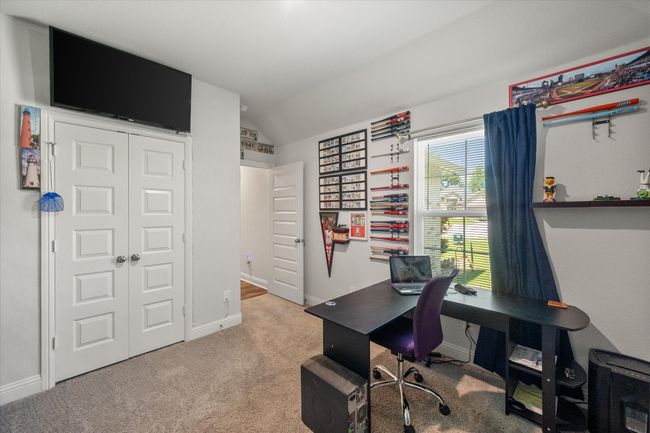 Bedroom being used as a home office. | Image 16