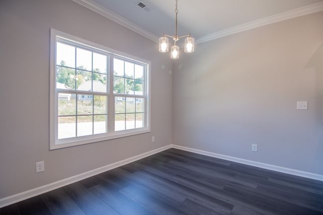 EXAMPLE>>>Eat-In Area with a Beautiful Chandelier and Natural Lighting Overlooking the Backyard! | Image 8