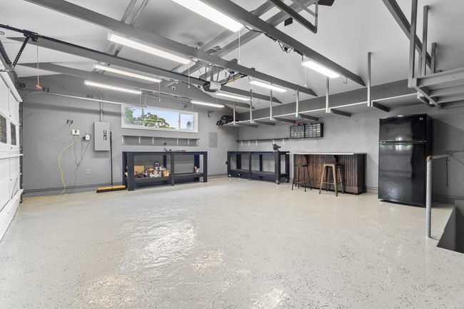 Additional refrigerator and bar make this a hangout spot | Image 12