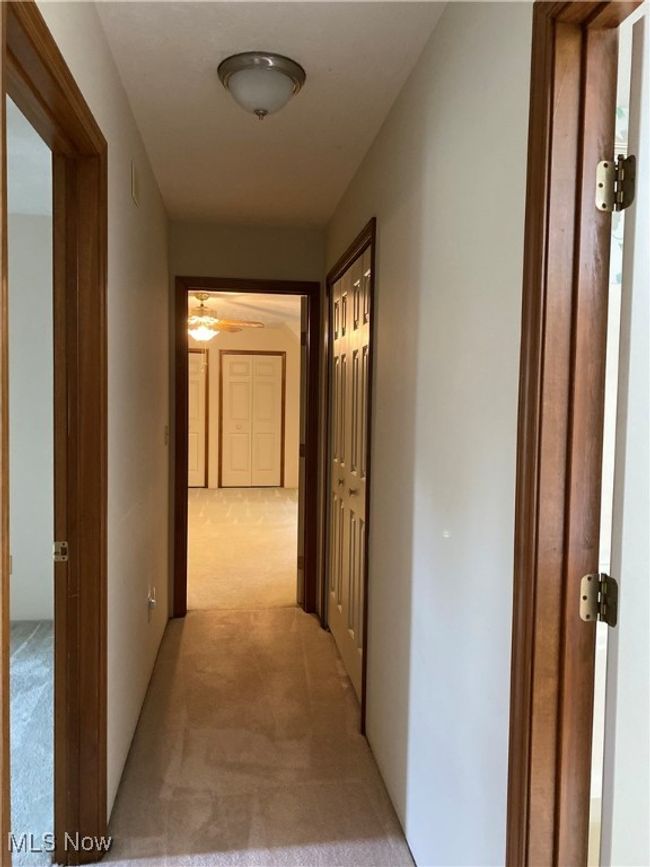 Hallway with light carpet | Image 16
