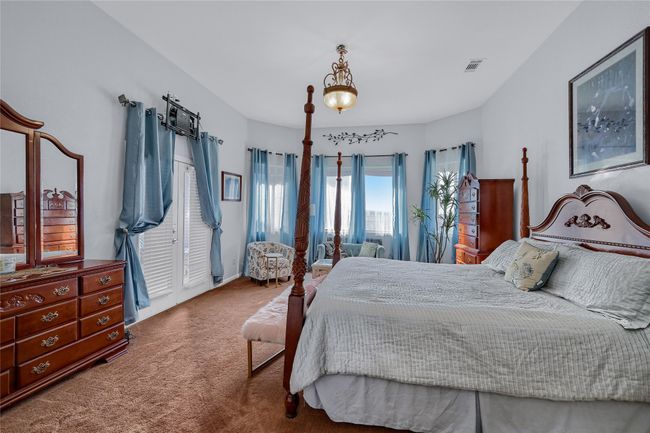 Bedroom with carpet floors | Image 18