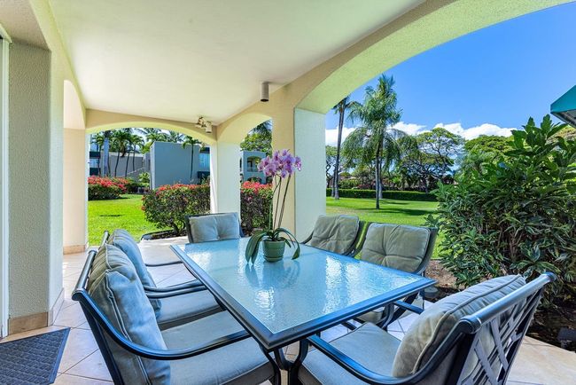 Enjoy your meals al fresco on the covered & tiled lanai with lovely views of the meticulously | Image 27