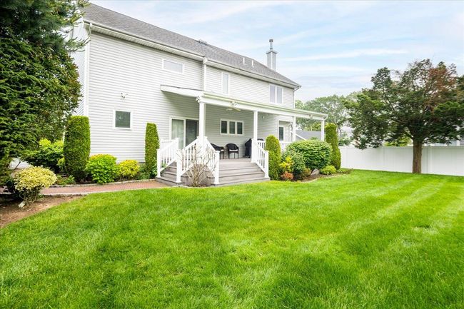 Rear view of property with a chimney and roof with shingles | Image 34