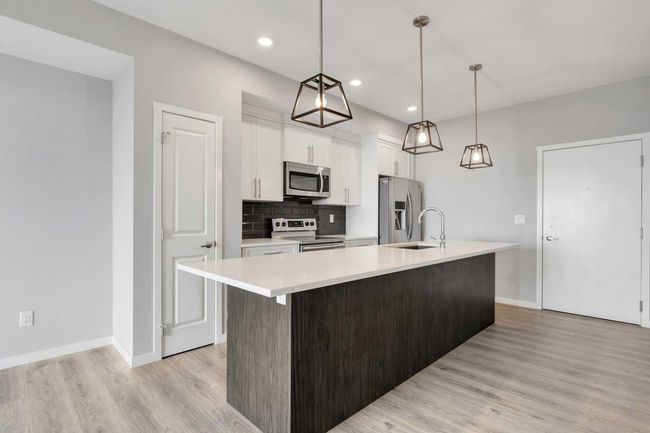 417 - 4350 Seton Dr Se, Condo with 1 bedrooms, 1 bathrooms and 1 parking in Calgary AB | Image 6