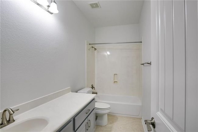 Full bath with vanity and bathing tub / shower combination | Image 26