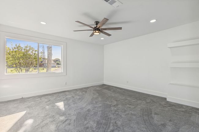 Spare room featuring recessed lighting, visible vents, baseboards, and ceiling fan | Image 26