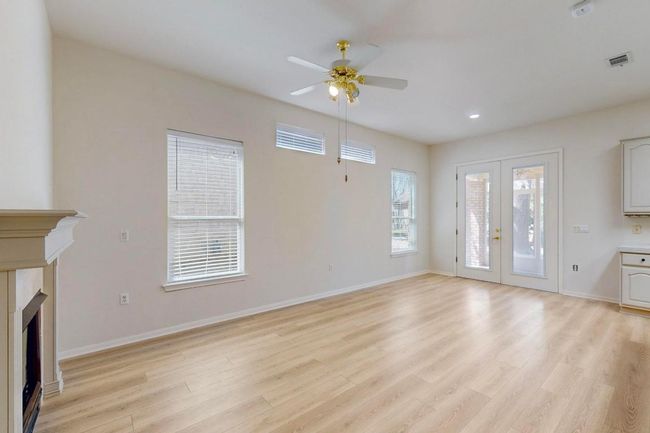 located in the kitchen wing, access to enclosed porch, fireplace and breakfast nook | Image 11
