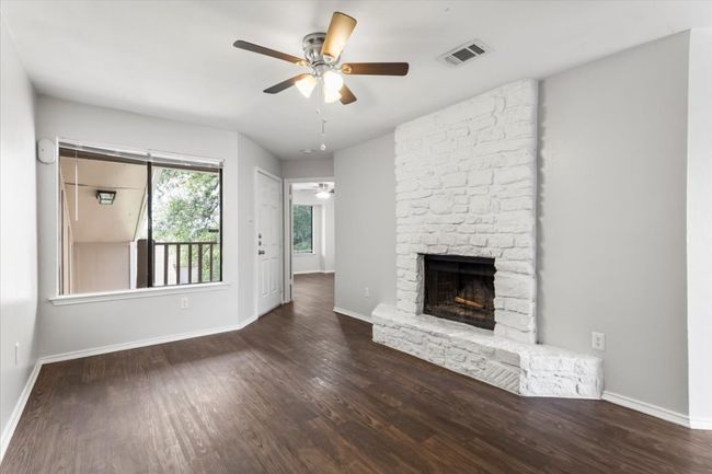 Condo entry with bedroom off front of unit allowing for privacy from other resident | Image 4