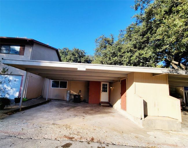View of side of property with central air condition unit and a carport | Image 20