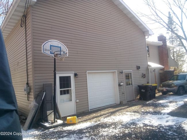 Entrance to large Rec room above Garage | Image 7