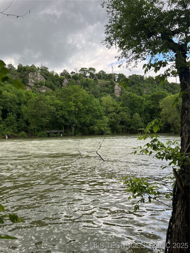 Water view featuring a forest | Image 44
