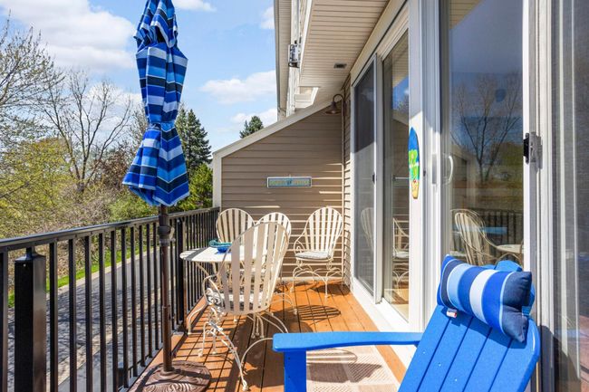 Private deck with southern exposure. Notice the double patio doors off the living room. | Image 10
