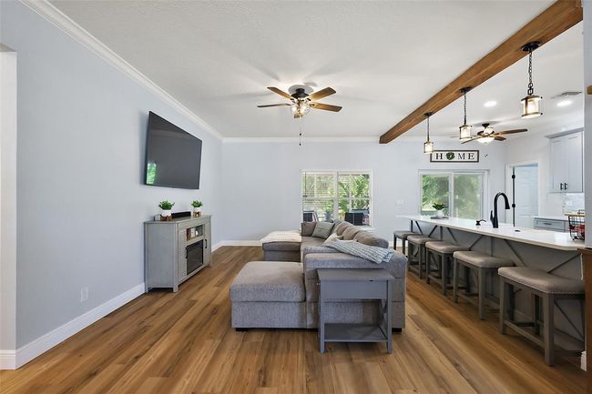 Bright and inviting open layout with all new LVP flooring | Image 5