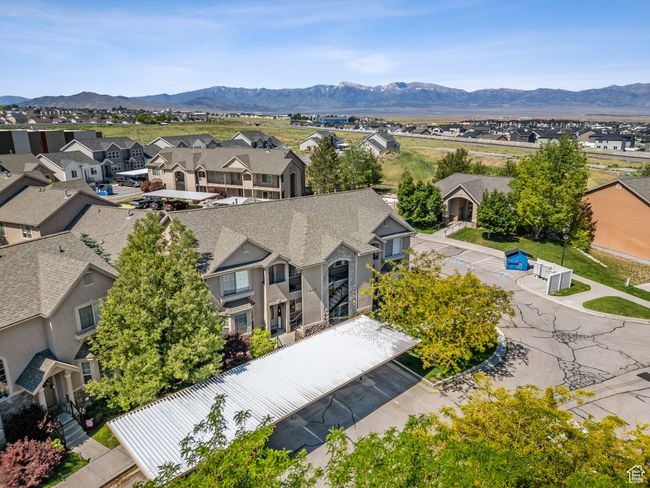 Aerial view of residential area featuring mountains | Image 5