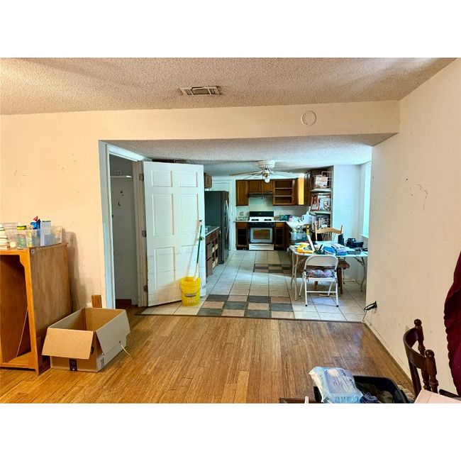 Living room looking to breakfast area and kitchen | Image 17