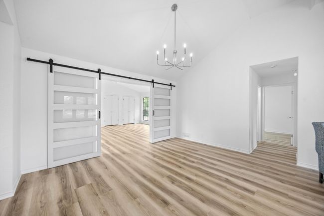 Dining area looking into second living area | Image 5
