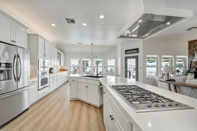 A chef’s dream kitchen — overflowing with cabinet space, endless counters, and room to create culinary magic | Image 16
