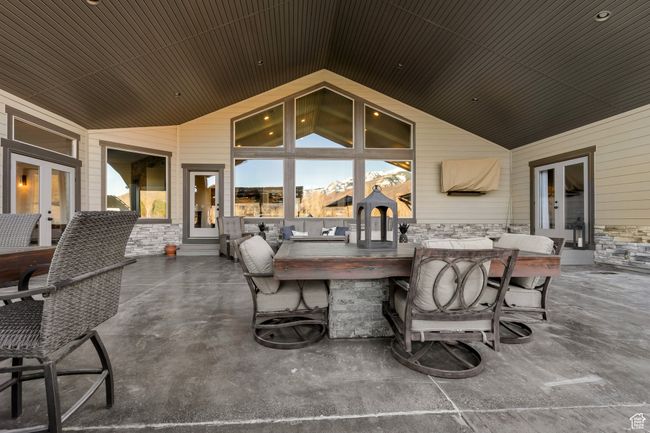 View of patio with french doors and outdoor dry bar | Image 34