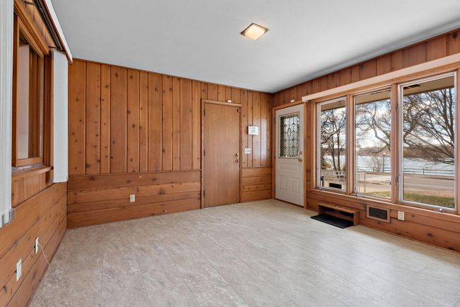 As you step into the breezeway, you will feel the love this one family owned home has! You get your mail delivered right to your front door! | Image 23