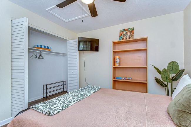 large walk in closet for the guest bedroom | Image 7