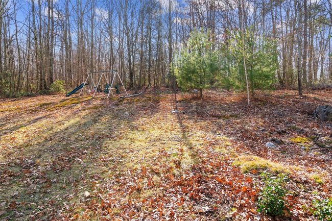 View of yard with a playground | Image 19