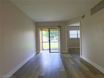 Unfurnished room with wood-type flooring | Image 3