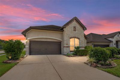 Discover the elegance of 5007 Wheaton Park Drive—a charming Sugar Land residence where comfort meets style under a breathtaking sunset sky. | Image 2