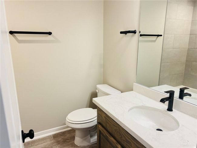 Bathroom with vanity and toilet | Image 8