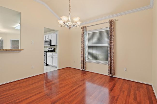 The dining room is just off the kitchen which is perfect for entertaining. | Image 5