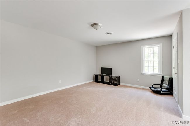 Bedroom featuring carpet and 2 closets | Image 25