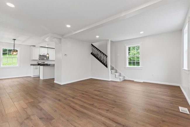 Beautiful open concept Living area flowing into the kitchen and dining. | Image 3