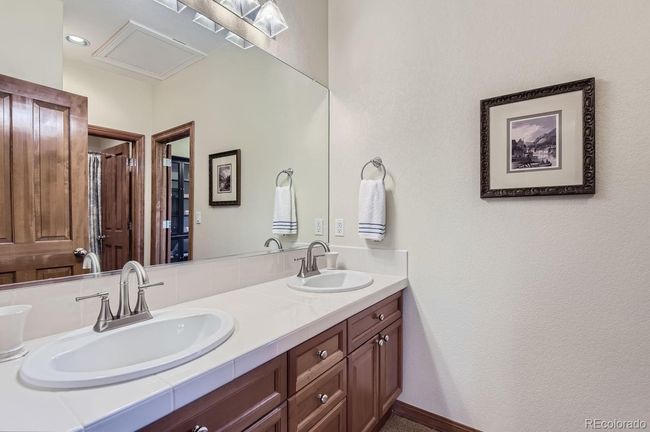 Jack-and-Jill bath with private vanity for each room! | Image 38