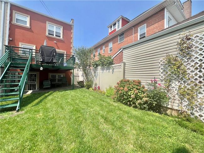 View of yard featuring a deck | Image 26