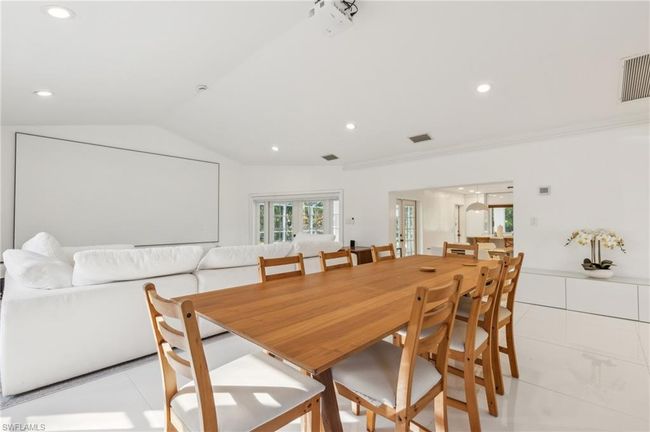 Dining area featuring vaulted ceiling, recessed lighting, and visible vents | Image 14