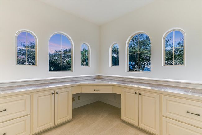 Built-in desk and cabinetry on second floor | Image 27