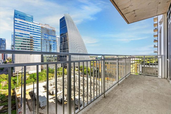 Balcony featuring a city view | Image 15