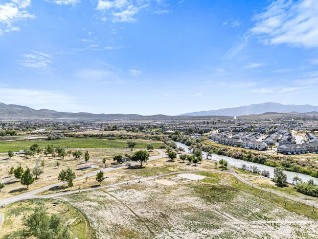 Mountain view featuring nearby suburban area | Image 35