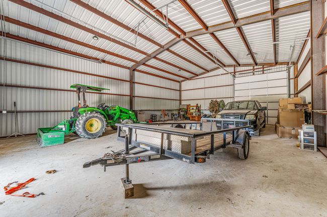 Garage featuring metal wall | Image 18