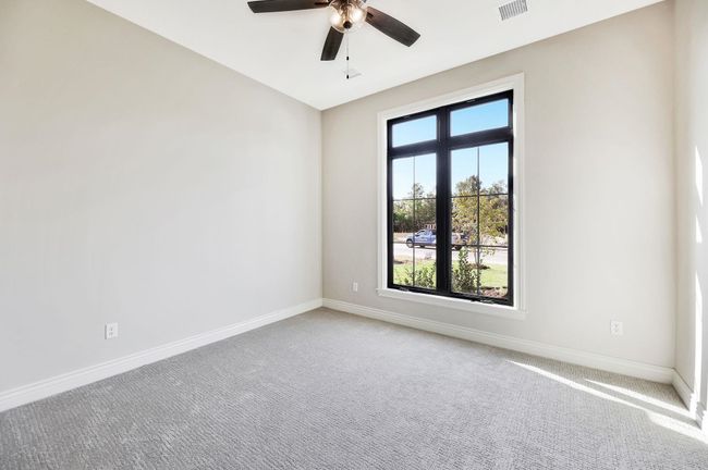 Carpeted spare room with ceiling fan | Image 30