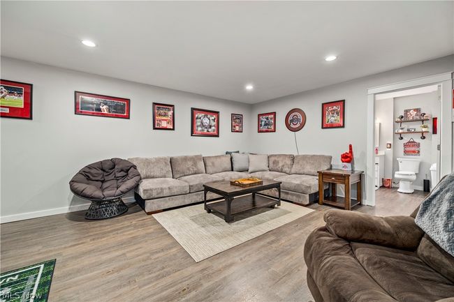 Living room featuring wood-type flooring | Image 34