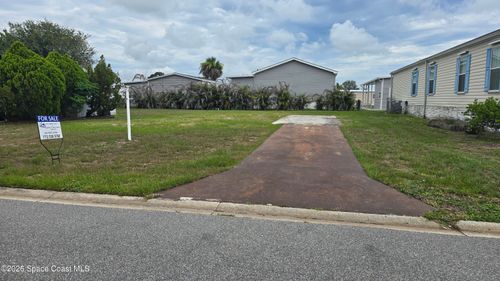 855 Hawthorn Cir, Barefoot Bay, FL, 32976-7396 | Card Image