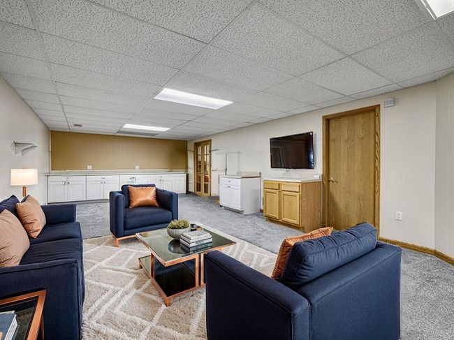 Virtually Staged lower-level family room | Image 21