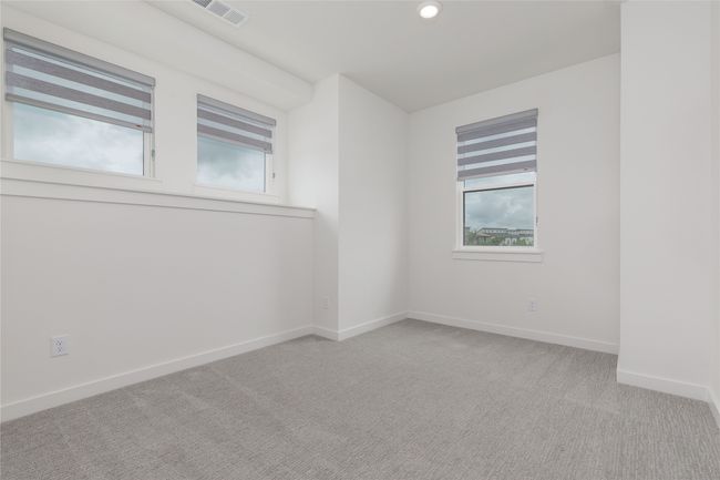 Empty room with carpet and recessed lighting | Image 20