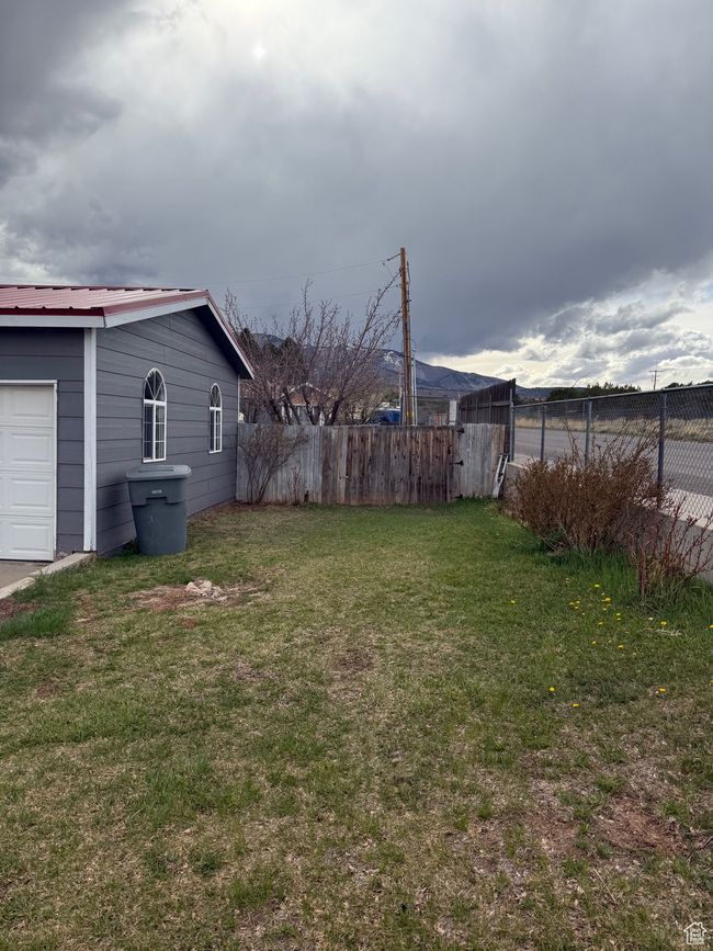 View of yard featuring fence | Image 5